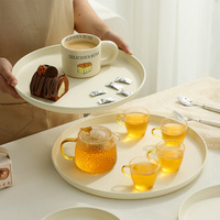 Plateau rond en céramique, plateau à eau et à thé pour la maison, plateau de service esthétique haut de gamme pour hôtel, rangement de collations et de nourriture