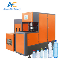 Machine de soufflage semi-automatique pour bouteilles PET de marque SMC, prix bas, état neuf, incluant PLC, pompe, moteur et roulement pour la fabrication de bouteilles PP
