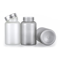 Flacon cylindrique industriel de 250 ml en PET mat gris avec impression sérigraphique et bouchon à vis
