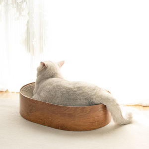 Diskon besar grosir bantalan goresan kucing karton bergelombang Premium bentuk Oval furnitur hewan peliharaan OEM untuk kucing dalam ruangan - Product Image 5
