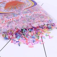 Super pas cher 450 g/sac 2*6mm arc-en-ciel coloré bonbons clairon perles Tube de verre entretoise perles en vrac pour collier à faire soi-même Bracelet bijoux