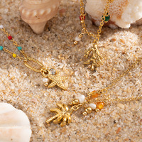 Ocean Series Collar de acero inoxidable chapado en oro de 18 quilates Perla Flor Coral Cerámica Estrella de mar Pescado de mar Collar de verano