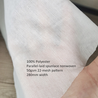 Tissu non tissé texturé en maille respirant 100% polyester 50 g/m² à pose parallèle uni/à pois pour lingettes humides et masques jetables
