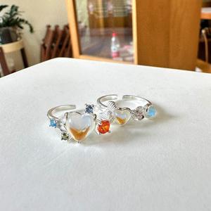 Bague en argent sterling S925 avec nœud d'amour arc-en-ciel avec placage 18 carats Style romantique haut de gamme sertie de diamants et de pierres de lune - Product Image 1