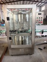 Machine de remplissage automatique rotative à pression négative pour vin rouge et vin de fruits
