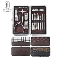 Ensemble de coupe-ongles Longhui 12 en 1 en acier inoxydable avec motif visage souriant, ensemble d'outils professionnels de manucure et de pédicure, kit pour les ongles