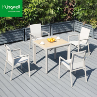 Table et chaises de salle à manger d'extérieur modernes en aluminium tressé, résistantes aux UV et imperméables, pour hôtels et villas