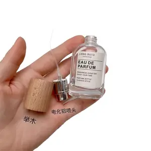 Venta al por mayor de lujo personalizado redondo transparente embalaje vacío spray botella de perfume de vidrio 30ml 50ml 100ml
