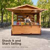 Kiosque pliant en bois pour stand alimentaire de Noël, utilisation événementielle ou en marché.