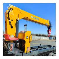 Prix usine 4 tonnes grue à flèche articulée camion HOWO avec grue télécommande grue de levage hydraulique pour bâtiment de ferme