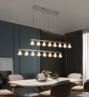 Luminaire suspendu en forme de fleur en cristal, style ambiance romantique, idéal pour les chambres et les salles à manger.