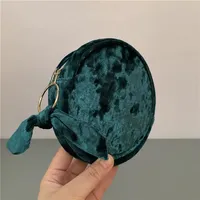 Pochette de voyage ronde en velours pour mini-rouge à lèvres avec poches intégrées, trousse de toilette portable