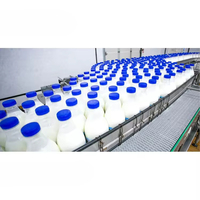 Ligne de production de boissons laitières entièrement automatique, machine de remplissage rotative par soufflage pour bouteilles en PET, lait pasteurisé
