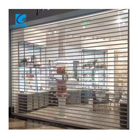 Porte à enroulement automatique en polycarbonate transparent pour supermarché et centre commercial