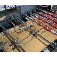Machine automatique multifonctionnelle pour l'emballage de petits articles en papier et la fabrication d'enveloppes