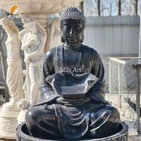 Statue de bouddha en pierre de marbre noir antique fontaine d'eau extérieure à vendre