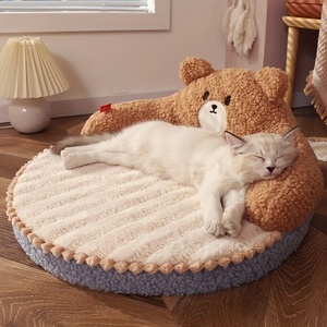 Een zacht en duurzaam rond katten- en hondenbed, geschikt voor puppy's en volwassen katten, afneembaar en te gebruiken binnen of buiten. - Product Image 1