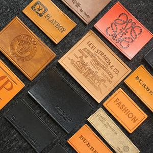 Op maat gemaakte lasergegraveerde, gestempelde, geprägte lederen label, hete pers geëmbosseerd, op te naaien PU lederen <span class=keywords><strong>patch</strong></span> voor spijkerjassen - Product Image 1