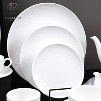 Ensemble de vaisselle en céramique ronde blanche de qualité supérieure en gros, motif en relief, pour hôtel et restaurant