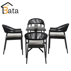 Lüks bahçe açık kamışı mobilya Rattan yemek masası seti 4 sandalye