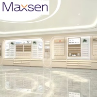 Comptoir d'exposition de lunettes de soleil rectangulaire en fer et bois au design moderne personnalisable Maxsen avec éclairage LED pour le commerce