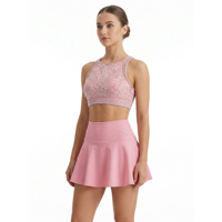 Conjunto de uniforme de porristas personalizado con top halter adornado con pedrería y falda pantalón para práctica de porristas