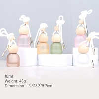 Bouteille suspendue colorée vide rose givré clair 10ml diffuseur de parfum de voiture en verre rond avec couvercle en bois