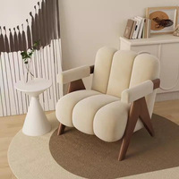 Fauteuil d'appoint en tissu bouclé pour salon moderne, design de projet hôtelier, fauteuil lounge en velours et bois massif