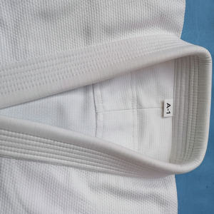 Karate Gi negro personalizado con costuras blancas 100% algodón Unisex hecho en Pakistán de alta calidad - Product Image 1