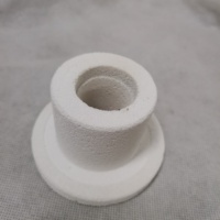 Blocs d'étanchéité en fibre céramique thermoformés avec trous pré-perforés pour la protection de l'entrée des éléments chauffants