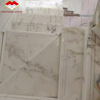 Grande dalle de marbre Calacatta blanc à veines dorées, polie, design moderne, qualité supérieure, pour hôtels, escaliers, revêtements muraux et comptoirs.
