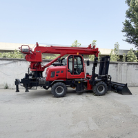 Chariot élévateur tout-terrain diesel multifonctionnel 4x4 avec grue à flèche hydraulique montée à l'arrière et mât à deux étages pour terrains montagneux