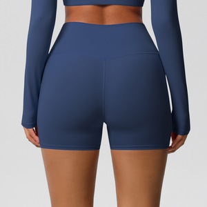 Shorts de ciclista de cintura alta para mujer al por mayor con bolsillo para teléfono, efecto melocotón, control de abdomen, transpirables, elásticos, para yoga y fitness OEM ODM - Product Image 5