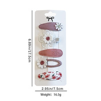 Ensemble de pinces à cheveux en tissu doux et antidérapant avec motifs de fleurs mignonnes pour petites filles, idéal pour les fêtes et l'usage quotidien