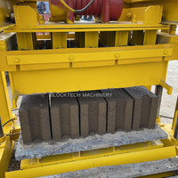 Machine à fabriquer des blocs de briques solides QT4-40, rapide et à vibration continue, capable de produire tous types de blocs : creux, pleins et pavés