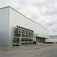 Almacén Prefabricado de Estructura de Acero Impermeable e Ignífugo con Puerta Enrollable
