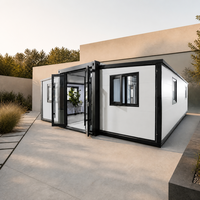 Maison conteneur préfabriquée de luxe moderne en acier léger de 20 pieds avec toit à pignon, terrasse enveloppante, module rapide, respirante, certifiée CE
