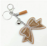 Koningsblauwe modieuze strikvormige sleutelhanger met volledig bezette strass steentjes en kwastjes, hoogwaardig, best verkochte charme hangende ornament