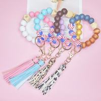 USA Drapeau Bois Perle Bracelet Bracelet Élastique Bracelet Porte-clés Jour de l'Indépendance USA Drapeau Cuir Gland Alliage Porte-clés Porte-clés