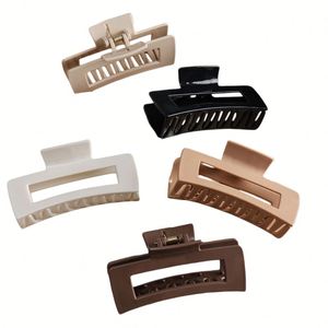 X527 Pince à cheveux en silicone souple de haute qualité, grande, couleur unie, carrée évidée, pour queue de cheval, anti-glissement, tendance - Product Image 1
