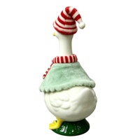 Figurine d'oie de Noël peinte à la main OEM ODM avec chapeau de Père Noël rayé et écharpe, cape en peluche vert clair, décoration de table pour les fêtes, cadeau