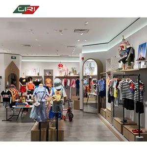Présentoir de vêtements de bébé de mode pour vitrine de magasin présentoir de vêtements étagères de support de mode pour les magasins de détail