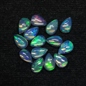 Cabochons de poire opale éthiopienne de feu naturel de 8mm 12mm pierre précieuse en vrac à dos plat de prix abordable la plus vendue pour la fabrication de pendentif anneau - Product Image 1