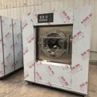 Machine d'élimination des saletés entièrement automatique de 30 kg pour les écoles, avec grande capacité, paramètres programmables et utilisation facile.