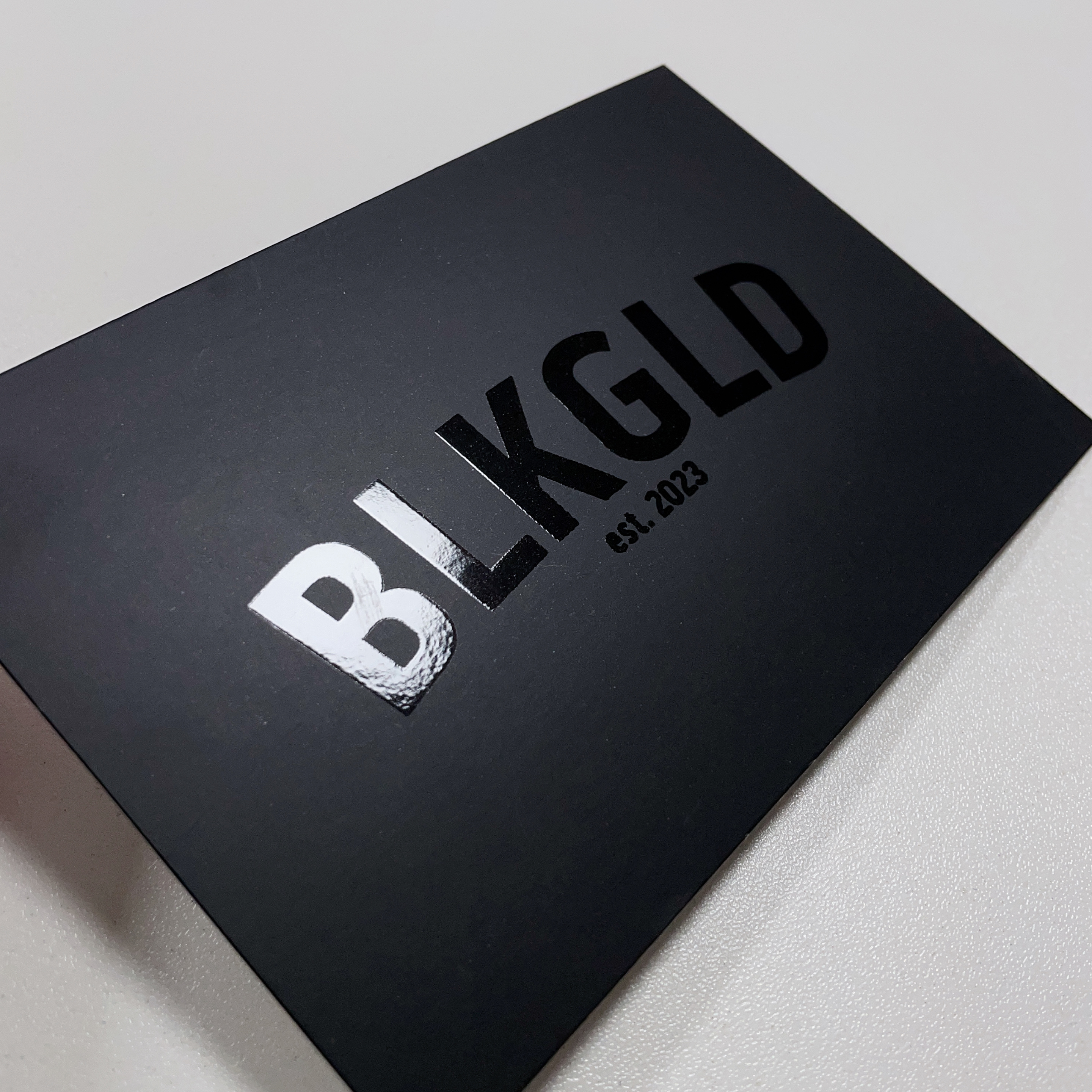 Black card with black UV
