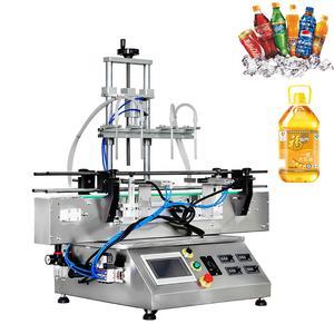 Máquina Automática de Llenado de Líquidos de Alta Precisión con Control PLC para Bebidas, Aceite, Envases de Vidrio y Bolsas, de Escala Pequeña para Colocación en Escritorio - Product Image 1