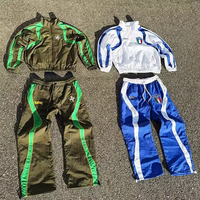Ensemble de jogging deux pièces personnalisé avec fermeture éclair, coupe-vent léger, imperméable, veste et pantalon de survêtement en nylon