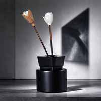Diffuseur d'arômes en verre rond noir mat de 100 ml pour l'aromathérapie avec couvercle