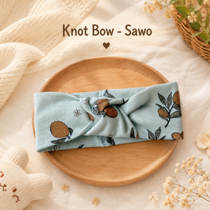 Adorable sapodilla knot bow with soft fabric secure fit and timeless elegance perfect for parties photos and everyday styling - Product Image 5