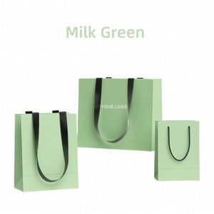 Hot Sale Custom LOGO Luxury <b>Gift</b> Boutique Packaging Shopping Clothing Paper <b>Bags</b> With Ribbon Handle - Product Image 2